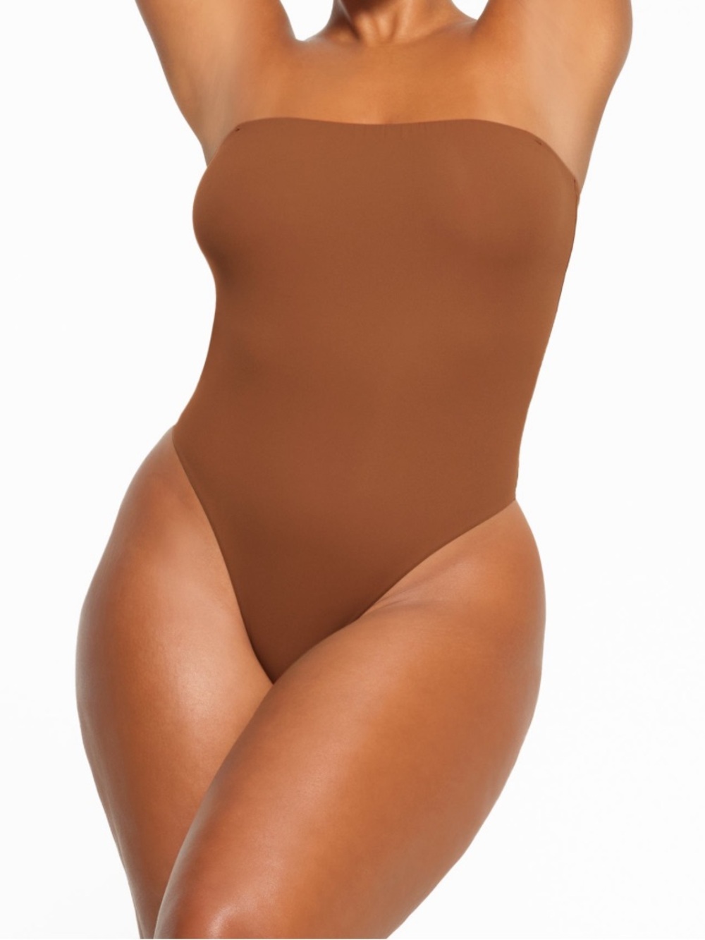 SKIMS Strapless Seamless Bodysuit in Bronze